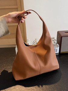 Sac fourre-tout hobo marron vintage en cuir grainé pour le transport quotidien des femmes