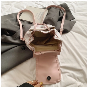 Pink and cream contrast floral mini backpack with drawstring and magnetic closure