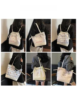Composite view of canvas tote bags featuring cartoon graphics and striped patterns