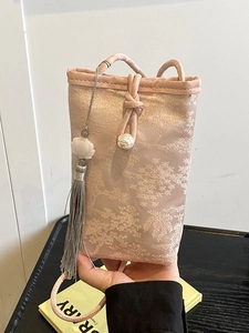 New Chinese style jacquard phone bag with pink brocade and tassel pendant in hand