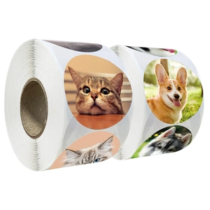 Roll of 1000 round animal stickers featuring cute cat and dog portraits for decoration