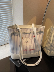 Large capacity striped tote bag with seal pattern and stylish shoulder straps for women