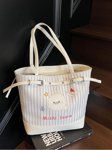 Large blue and white striped tote bag with cute seal print and premium leather handles