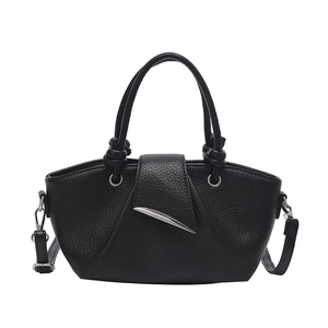 Vintage pleated black leather bucket bag with silver crescent hardware and crossbody strap