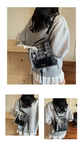 Detail view of mini plaid backpack with leather flap, lace bow and pearl chain charm