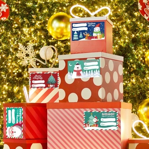 500 Christmas gift tags roll with Santa and Reindeer designs on festive gift boxes