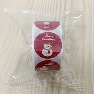 Roll of 500 Merry Christmas round stickers with Santa Claus and Snowman festive patterns