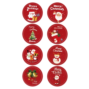 Roll of 8 assorted Christmas theme stickers with Santa and tree motifs for gift sealing