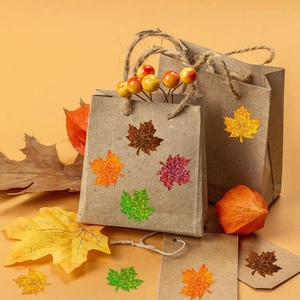 Glittering maple leaf stickers applied on kraft gift bags for Thanksgiving decoration