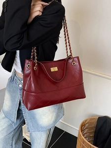Classic wine red quilted tote bag with gold chain straps and turn-lock closure for women