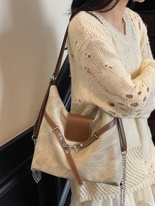 Contrast color large capacity crossbody backpack with adjustable leather strap and chain