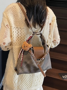 Contrast color large capacity backpack for women with bear pendant and retro leather straps