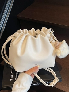 Women's PU Leather Ruched Bucket Bag Fashion Drawstring Cloud Shoulder Bag With Plush Pendant Charm Commuter Small Handbag