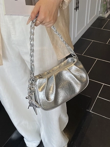 Silver metallic pleated cloud bag with braided strap and balloon dog charm for women