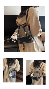 Detail view of vintage college style backpack with contrast patchwork and rivets