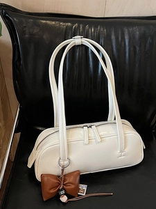 Fashionable creamy white glossy leather shoulder bag with large capacity and bow charm