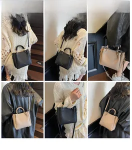 Detailed views of leather handbag in black and beige showing crossbody and hand-carry styles