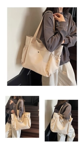Detail view of beige nylon shoulder bag with snap pockets and spacious side compartments