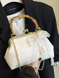 Lace evening bag with bamboo handle, pearl bow tassel, and gold chain strap for women