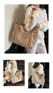 Detail of canvas tote bag showing side drawstring compartments and front magnetic pocket