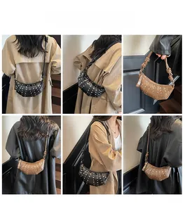 Detail shots of studded crescent moon bag in black and brown styles for women