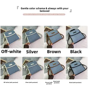 Detail view of denim backpack options in cream silver brown and black with star pendant