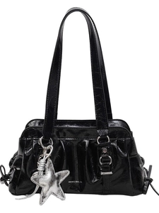 Glossy black shoulder bag with stylish star pendant and metallic accents on white background
