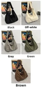 Detail view of large canvas tote bags in five colors with adjustable wide shoulder straps