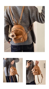 Brown faux suede mini backpack featuring a plush sheep pendant and adjustable straps