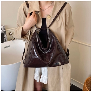 Deep brown glossy oil wax leather tote bag with silver chain and heart padlock detail