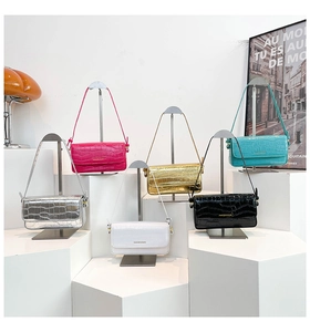 Stone textured underarm bags in multiple colors featuring elegant crocodile embossed PU