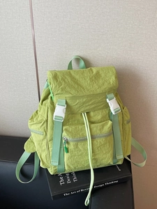 Large grass green canvas travel backpack with white buckles for students and outdoor leisure