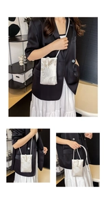 Detail of mini crossbody phone bag with traditional Chinese floral patterns and rope strap
