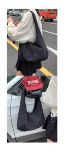 Large black hobo shoulder bag in lightweight nylon fabric for daily commuting