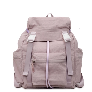 Sac à dos minimaliste en nylon lavande avec boucles blanches et grande poche frontale zippée