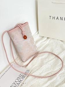 Pink jacquard mini crossbody bag with Chinese tree patterns and floral charm strap