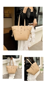 Close-up of beige tote bag featuring lychee grain leather and side drawstring detail