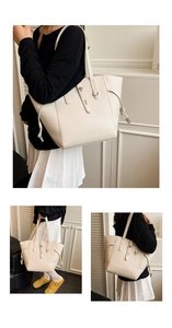 Close-up of cream-colored tote bag featuring lychee grain texture and drawstring detail