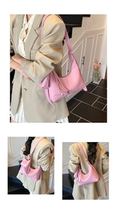 Pink lychee texture leather hobo bag with matching mini zipper pouch detail