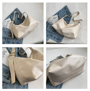 Detail views showing cream faux leather tote bag with wide strap and gold buckle