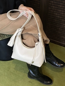 Chic off-white lychee grain leather hobo shoulder bag with silver pendant decoration