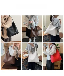 Detailed grid view of hobo style woven leather tote bags in four trendy colors