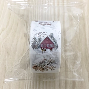 Rouleau d'autocollants de Noël ronds vintage avec rennes sur fond de bois naturel