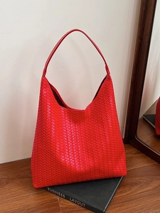 Classic red woven leather hobo tote bag with Intrecciato pattern and broad strap