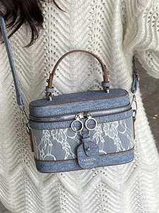 Blue denim box bag for women with white lace crochet floral pattern and metal handle