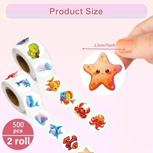 Two rolls of 1000 cartoon ocean animal stickers with a 2.5cm diameter for decoration