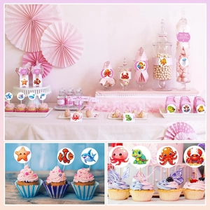 Ocean creature cupcake toppers set featuring cartoon sea animals for themed party decor