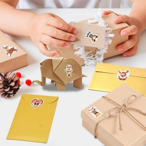 Christmas reindeer stickers decorating kraft gift boxes and envelopes with festive greetings