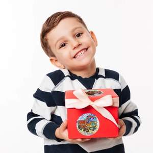 Holographic vehicle reward stickers on a red gift box held by a happy young boy