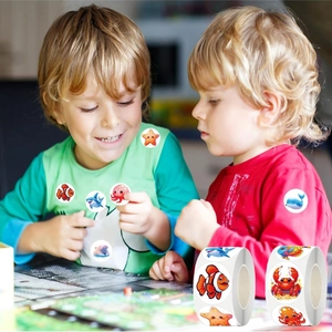 Detail of colorful marine animal cartoon roll stickers featuring sharks and clownfish